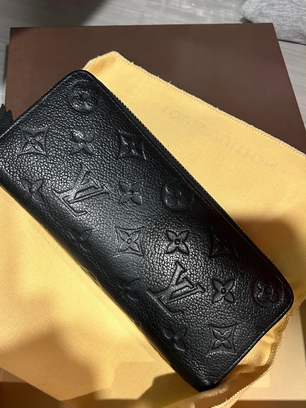 Louis Vuitton Zippy Wallet in black Monogram Empreinte embossed leather